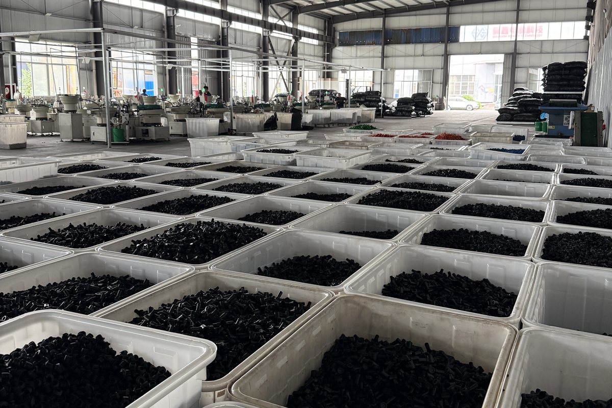 Irrigation components sorted by production batch in workshop bins